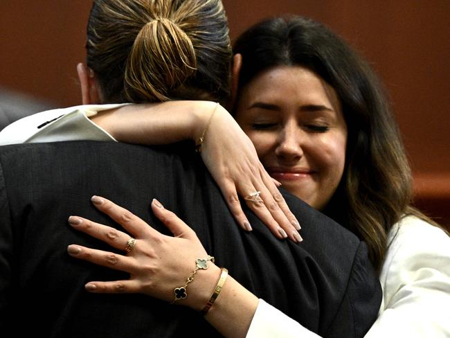 Lawyer Camille Vasquez embraces US actor Johnny Depp. Picture: AFP