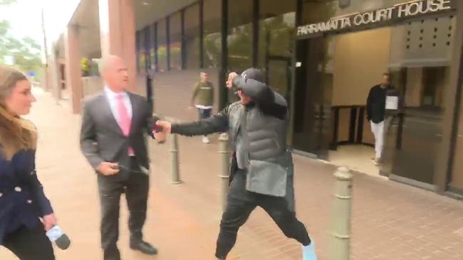 Faisal Zarshoy as he walks out the front doors of Parramatta Local Court. Picture: 7 NEWS