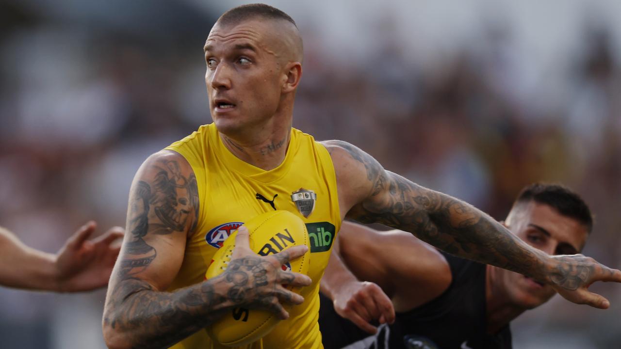 MELBOURNE , AUSTRALIA. February 27, 2024. AFL . Collingwood vs Richmond at Ikon Park, Carlton. Richmonds Dustin Martin fends off Nick Daicos of the Magpies during the 2nd qtr. . Pic: Michael Klein