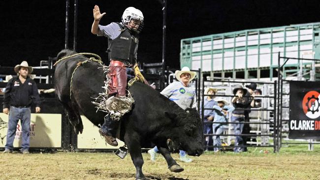 Levi Murray competes in the Great Northern Bull riding series bull ride event at the Mossman Showgrounds. Picture: Stephen Harman