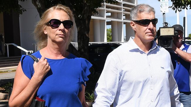 Former NT Police Assistant Commissioner Peter Bravos with wife, Cindy Bravos, outside the Supreme Court after pleading not guilty to two counts of rape.