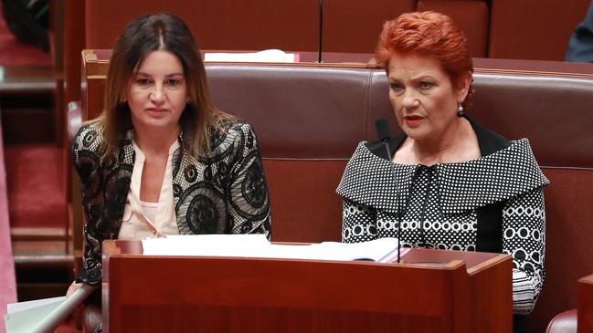 Senator Jacqui Lambie with Pauline Hanson before the vote on the Ensuring Integrity Bill in the Senate chamber last Thursday. Picture: Gary Ramage