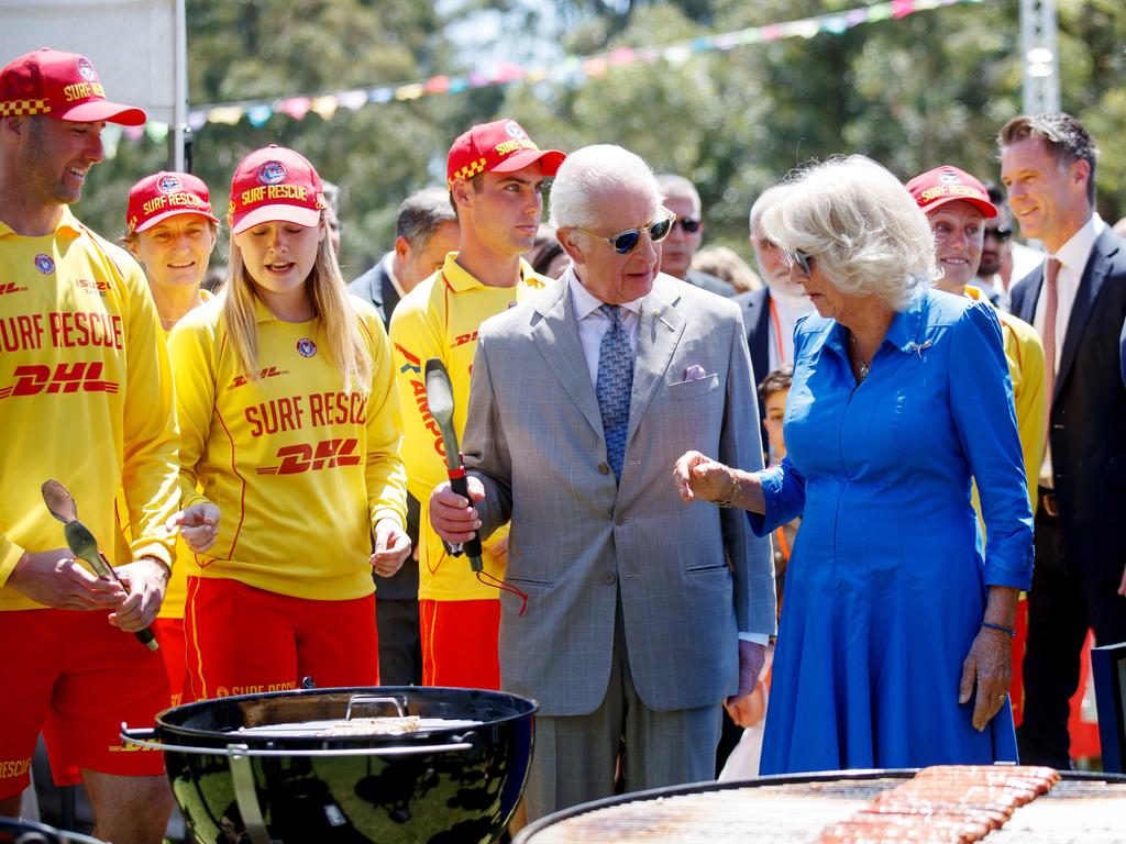 King Charles III and Queen Camilla have a go on the barbecue at Parramatta Park. Picture: NewsWire / Nikki Short