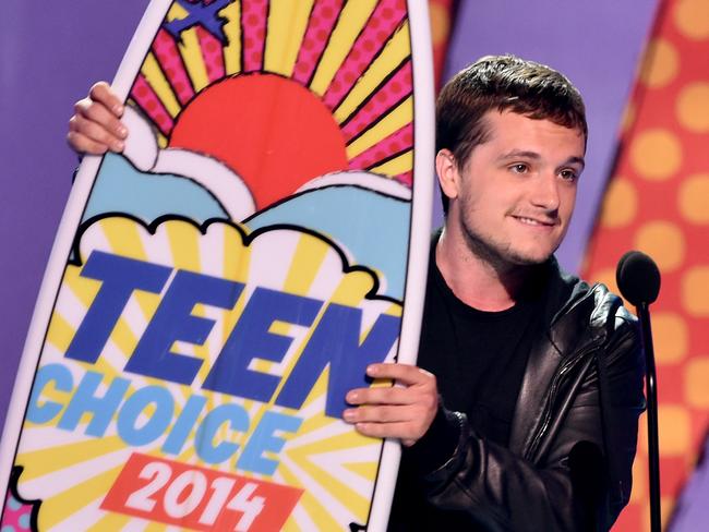 Hunger Games actor Josh Hutcherson, winner of Best Actor: Sci-Fi/Fantasy onstage during FOX’s 2014 Teen Choice Awards at The Shrine Auditorium. Picture: Getty