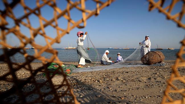 Emirati fishermen set up nets on the shore off the coast of Dalma island in the Gulf, near the Emirati capital Abu Dhabi. Picture: AFP