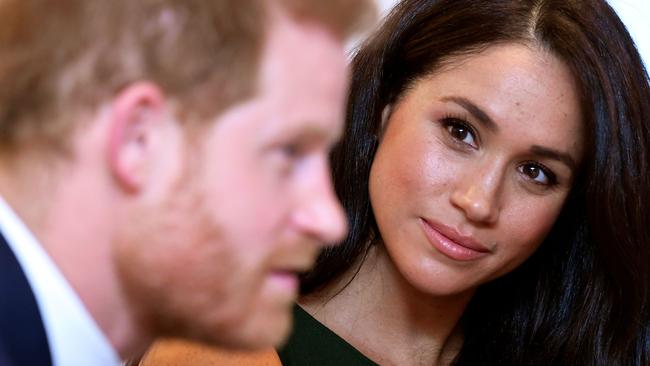 (FILES) In this file photo taken on October 15, 2019 Britain's Prince Harry, Duke of Sussex, and Britain's Meghan, Duchess of Sussex attend the annual WellChild Awards in London on October 15, 2019. - Prince Harry's wife Meghan will make an instant start to life away from Britain's royal frontline by narrating a new film about a family of African elephants, Disney announced on Thursday. (Photo by TOBY MELVILLE / POOL / AFP)