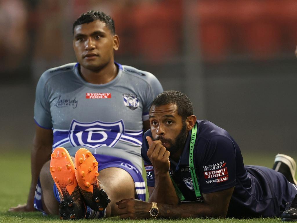 New Bulldogs recruits Tevita Pangai Jr and Josh Addo-Carr watch the trial against the Knights from the sidelines. Picture: Ashley Feder/Getty Images