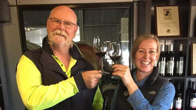 RED WIN: Ridgemill Estate's winemaker Peter McGlashan and vineyard hand Dawn Walker enjoy a glass of their award-winning Lincoln shiraz that collected a prize at the Cairns Wine Show. Picture: Contributed