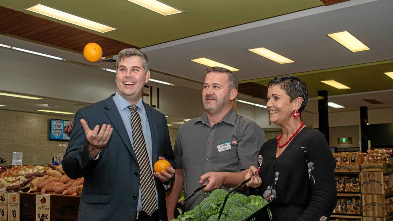 Minister for Corrective Services Mark Ryan, with Spanos IGA store manager Jason Raynor and Lockyer Valley Regional Council mayor Tanya Milligan. Picture: ALI KUCHEL