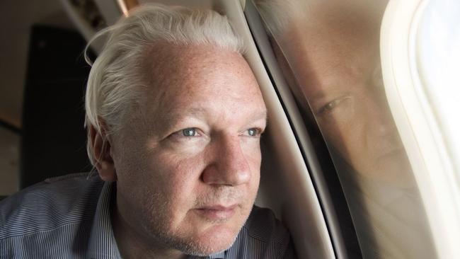 Julian Assange on a flight to Australia posted on WikiLeaks X page with the caption 