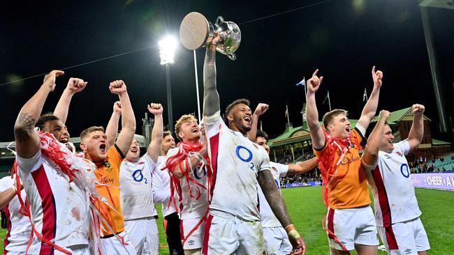 England's Courtney Lawes and teammates celebrate their victory. Picture: Saeed Khan/AFP