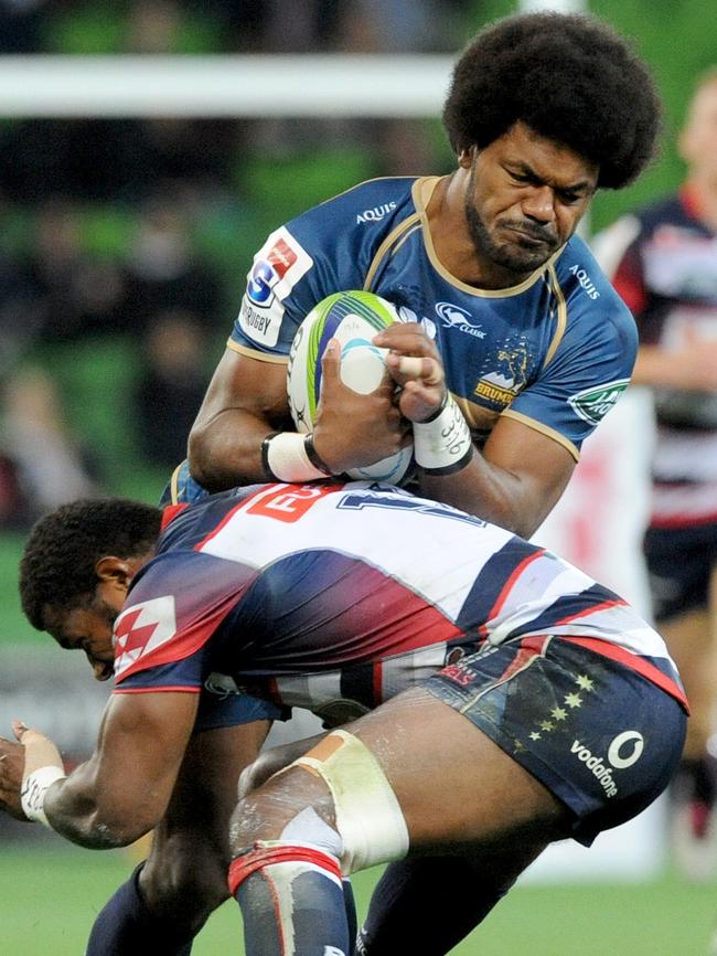 Henry Speight is tackled by Marika Koroibete.