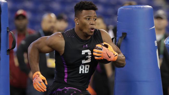 Penn State running back Saquon Barkley runs a drill at the NFL combine.