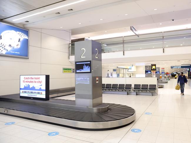 25th June 2021. Sydney domestic Airport arrivals hall looking quiet and many flights cancelled due to the growing Covid-19 outbreak in Sydney. Picture by Damian Shaw