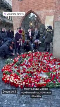 People Lay Flowers and Light Candles at Memorial for Victims of Prague Shooting