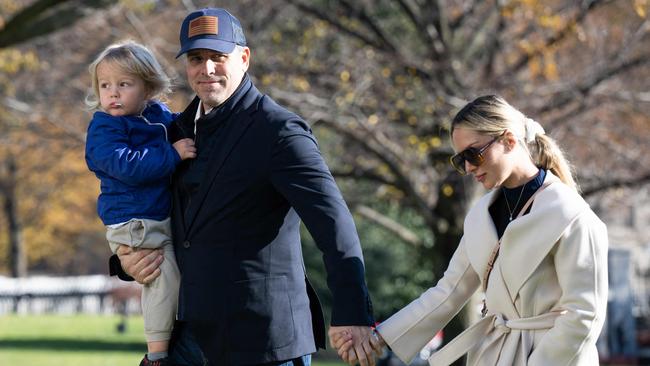 Hunter Biden carries his son Beau alongside his wife Melissa Cohen, as they disembark from Marine One. Picture: AFP