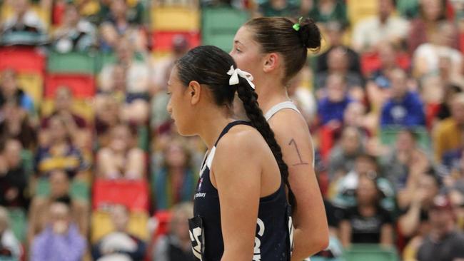 QISSN 2024 division one grand final - Canterbury College v Somerset College. Pictured: Jayda Penitani (blue) and Marley Burns (white)