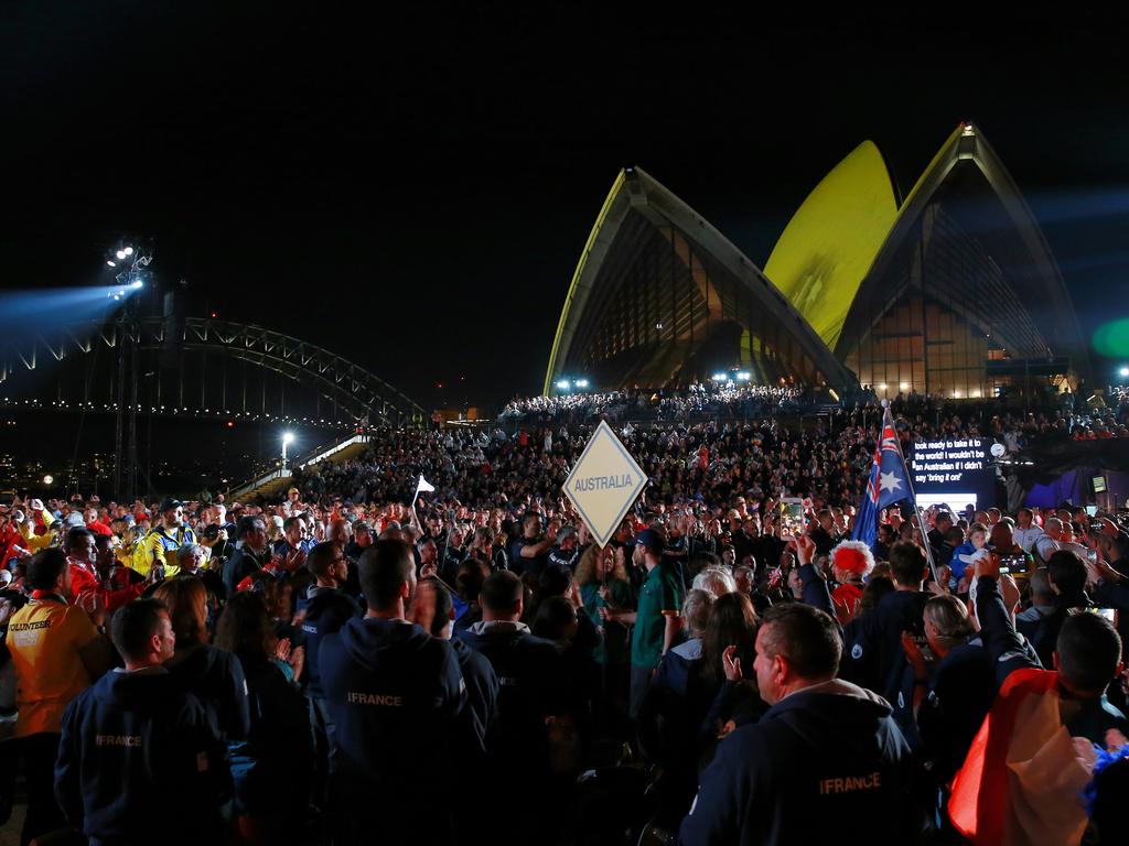 Australian athletes enter the forecourt of the Sydney Opera House for the opening ceremony. Picture: Toby Zerna