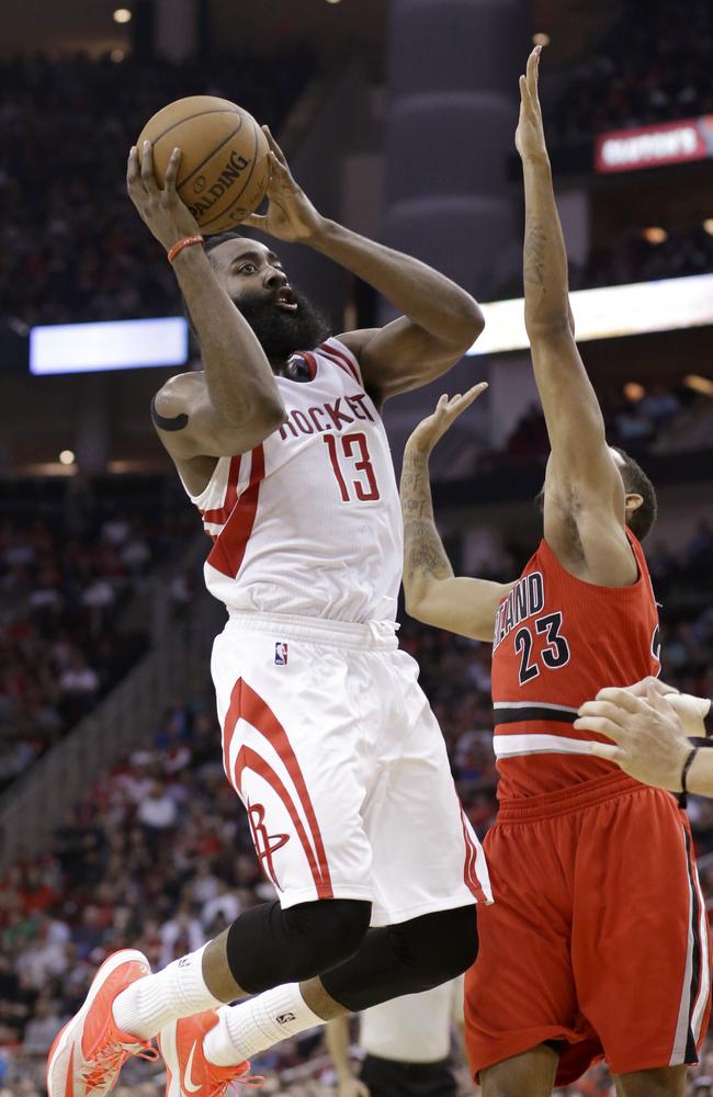 Houston Rockets’ James Harden shoots over Portland Trail Blazers’ Allen Crabbe. Picture: AP