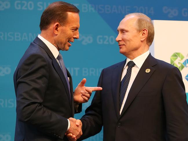 FILE - 26 AUGUST 2020: Ex Australian PM Tony Abbott has been hired by British PM Boris Johnson to become President of the UK's Board of Trade. He will hold the title jointly with UK Trade Secretary Liz Truss. BRISBANE, AUSTRALIA - NOVEMBER 15:  Australian Prime Minister Tony Abbott greets Russia's President Vladimir Putin during the official welcome at the Brisbane Convention and Exhibitions Centre on November 15, 2014 in Brisbane, Australia. World leaders have gathered in Brisbane for the annual G20 Summit and are expected to discuss economic growth, free trade and climate change as well as pressing issues including the situation in Ukraine and the Ebola crisis.  (Photo by Chris Hyde/Getty Images)