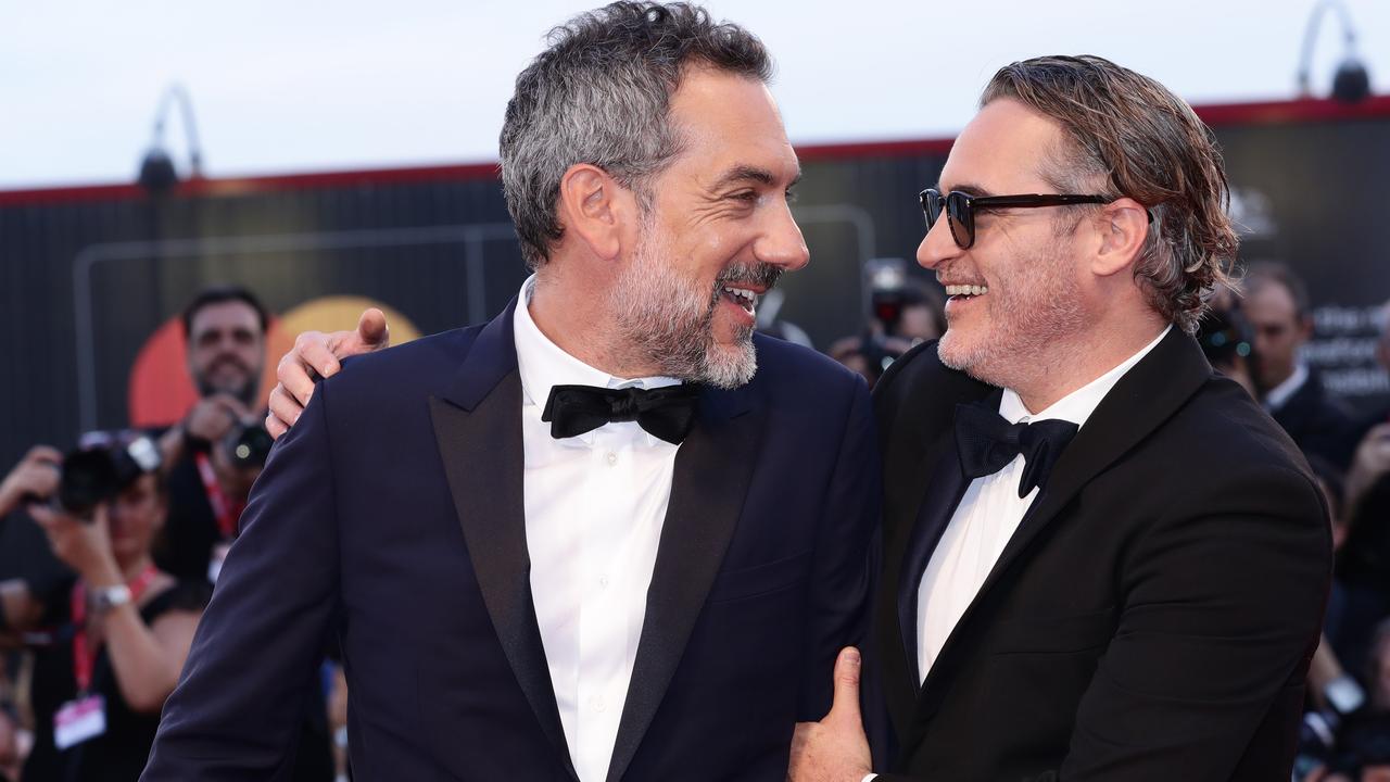 Phoenix (right) and Joker Director Todd Phillips at the 76th Venice Film Festival this week. Picture: Vittorio Zunino Celotto/Getty Images