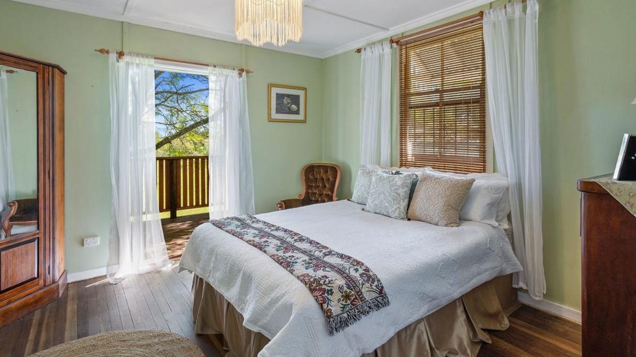 One of the bedrooms of the home attached to Goombungee Antiques and Cafe, 105 Mocatta St, Goombungee, is for sale.