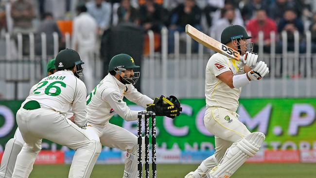 David Warner survived one over before bad light ended play. Picture: Aamir QURESHI / AFP