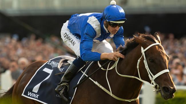 Mighty mare Winx, with Hugh Bowman aboard, charges to victory in the 2019 Queen Elizabeth Stakes at Randwick. Picture: AAP