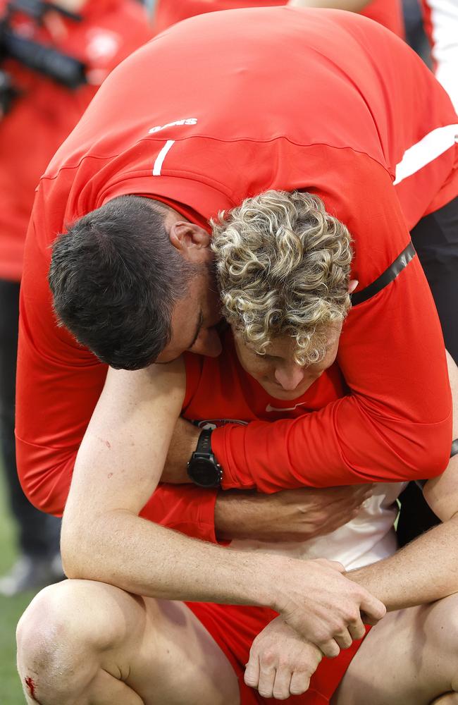 Dean Cox embraces Chad Warner following the Swans’ 2022 grand final defeat. Picture: Phil Hillyard