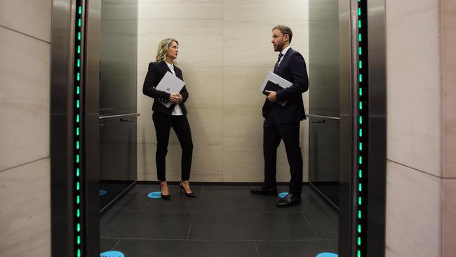 Investa group executive Sally Franklin and general manager Chris Molinaro in one of the company’s office lifts in Collins Street, Melbourne. Picture: Aaron Francis