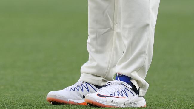 By day two of the Perth Test, Khawaja had written the names of daughters Ayla and Aisha over his shoes. Picture: Getty