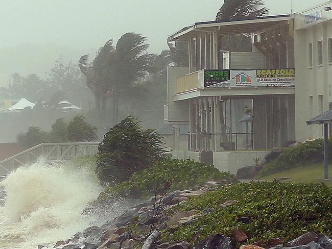 Strong winds and waves hit the coastal town of Yeppoon in north Queensland on February 20, 2015 after Tropical Cyclone Marcia made landfall. A powerful cyclone roared ashore in a heavily-populated area of Australia on February 20 with authorities warning of a "calamity" and residents told to expect "a harrowing and terrifying experience". AFP PHOTO / SHELLY ALLSOP