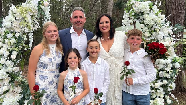 Corey and Margaux Parker with their four children at their vow renewal.