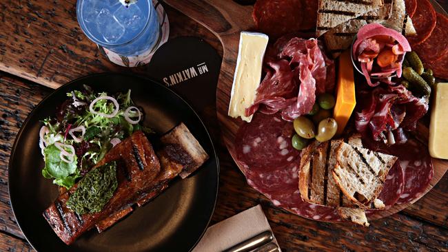 Beef asado and chimichurri with their charcuterie board with cheese. Picture: Adam Yip