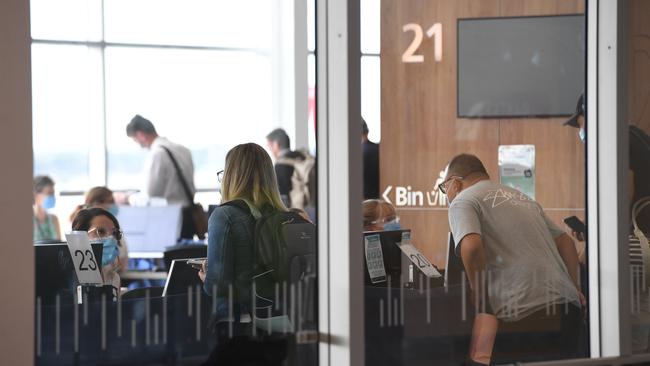 Recently arrived passengers at Adelaide Airport. Picture: Tricia Watkinson