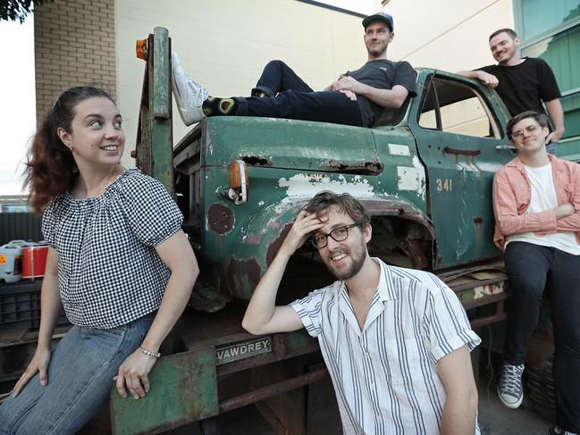 12/2/2018: L-R Jen Boyce (Bass/Vocals), Sam Cromack (vocals/guitar) Daniel Hanson,behind, (drums), Sam Cromack (vocals/guitar), Dean Hanson, back (guitar) and Paul Furness (keys), of Ball Park Music , a five-piece indie pop band from Brisbane, outside  a rehearsal studio in Stafford, Brisbane. The bands fifth album 'Good Mood' is being released on Feb 16. Lyndon Mechielsen/The Australian