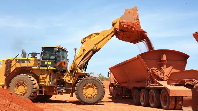 Surface stripping bauxite ore into trucks at the Bauxite Hills mine, 95km north of Weipa. Picture: Peter Carruthers