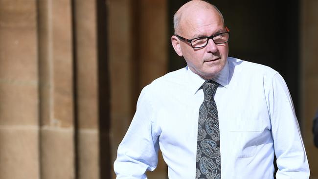 Former magistrate Bob Harrap leaves the Adelaide Magistrates Court after pleading guilty last month. Picture: Mark Brake