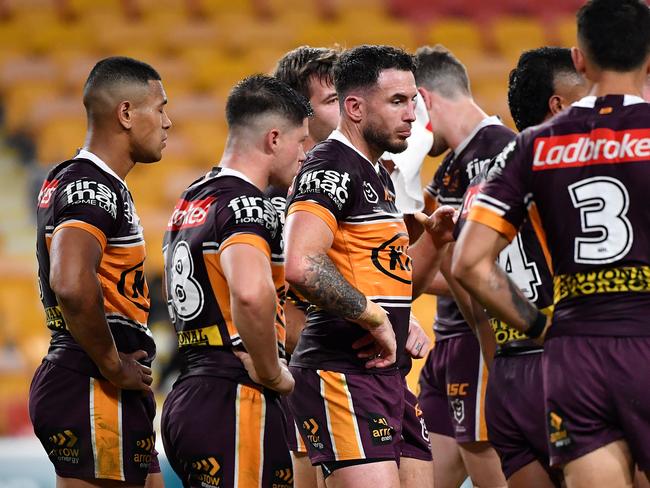 Darius Boyd (centre) stands dejected following a Roosters try during the Round 4 NRL match the Brisbane Broncos and the Sydney Roosters at Suncorp Stadium in Brisbane, Thursday, June 4, 2020. (AAP Image/Darren England) NO ARCHIVING, EDITORIAL USE ONLY