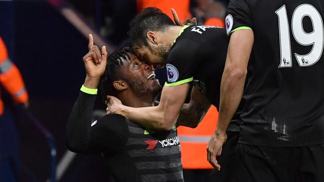 Chelsea's Belgian striker Michy Batshuayi (L) celebrates scoring the opening goal.