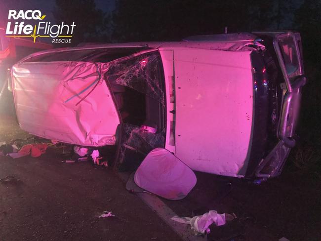 A woman was seriously injured after her car rolled three times on the Old Bruce Highway. Photo: LifeFlight