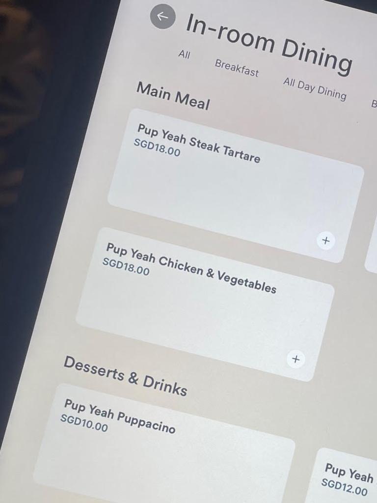 The in-room dining menu includes options for dogs.