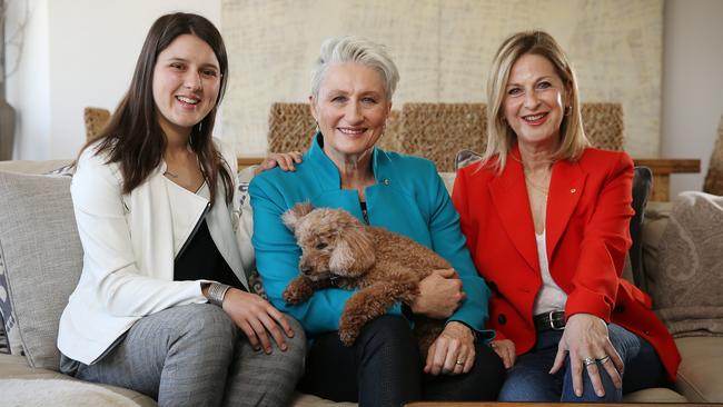 Kerryn Phelps (centre) with partner Jackie Stricker-Phelps and daughter Gabrielle at their Potts Point home. Picture: Sam Ruttyn