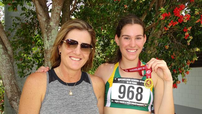 Courageous Ipswich and District Athletic club competitor Madison Wells with her mother Sharyn. Picture: Vic Pascoe