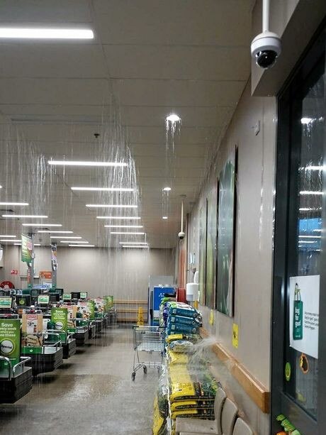 The Cooloola Cove Woolworths has closed down due to flooding from the tornado yesterday afternoon. Picture: Christian and Alice Sheridan