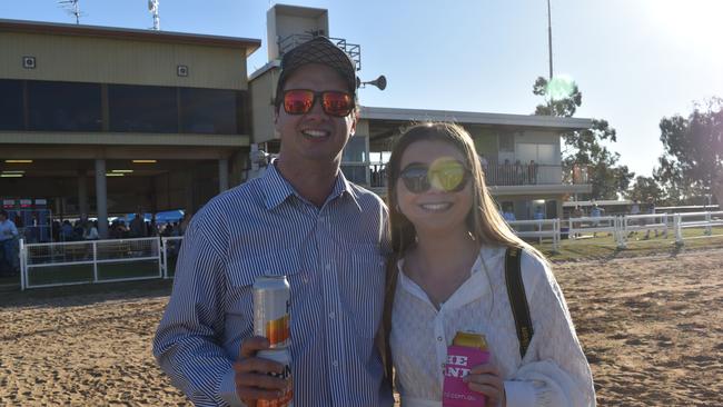 Spectators cheer on as they watch the B Grade St George vs Condamine match at the Roma Rugby Races at Bassett Park. Picture: Chloe Cufflin.