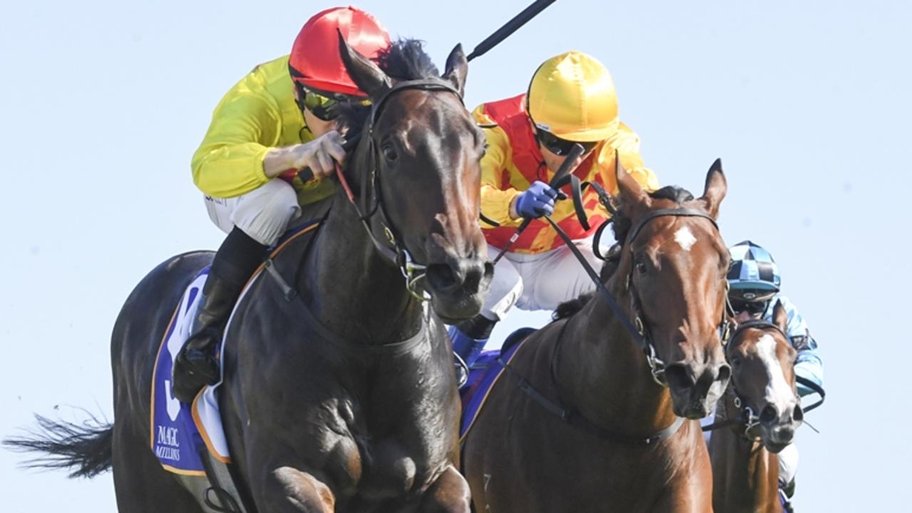 O' Ole (red cap) wins 2024 Magic Millions 2YO Classic from Memo. Picture: Bradley Photos