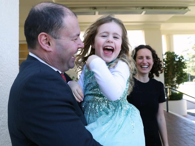 Treasurer Josh Frydenberg with his wife Amie and daughter Gemma, who donned a sequin-covered dress on Budget night. Picture: Gary Ramage