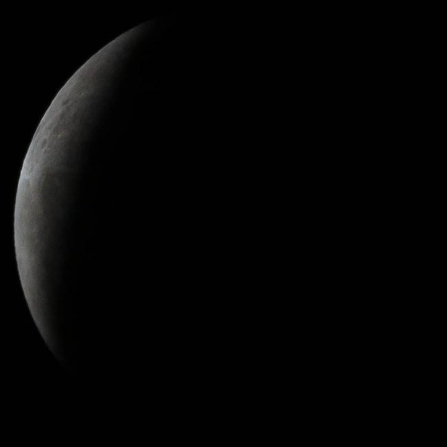 The super blood full moon seen over Darwin on Wednesday night. Pictures: Glenn Campbell