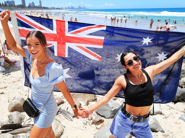 26th January 2021 - Melbourne friends Jess Occa and Georgia OÃDwyer celebrate Australia Day at Burleigh Heads beach.Photo: Scott Powick NEWSCORP